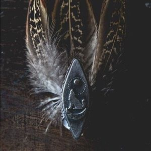 -SOLD-  The Noisy Plume Holler Back Ring